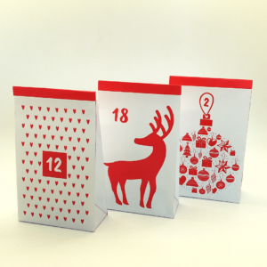 En julekalender med 24 poser - Lou Noire - røde papirposer til pakkekalender